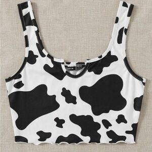 Small. Never worn. SHEIN cow print top.